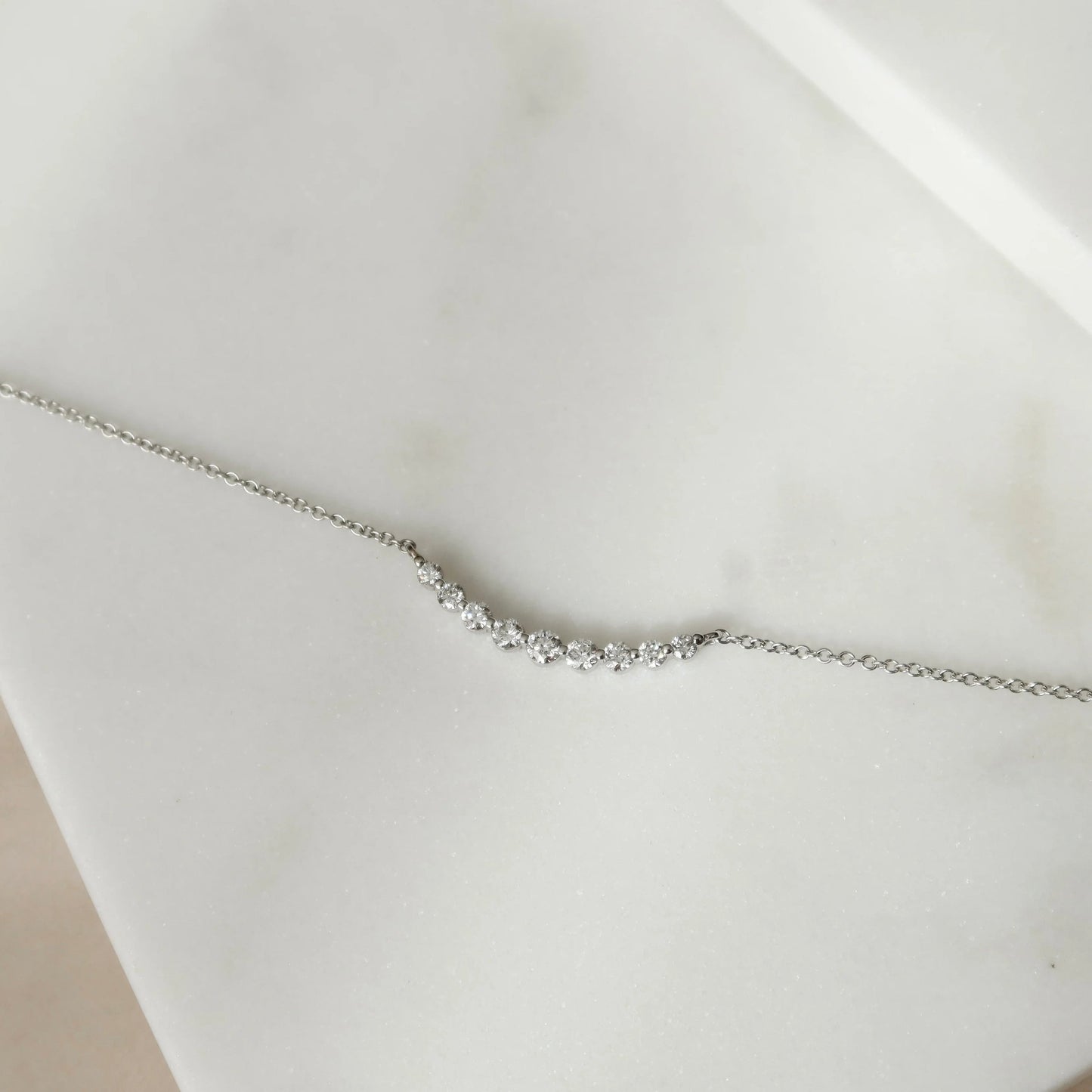 Lily-0.25 Carats Round Moissanite Curved Bubble Necklace
