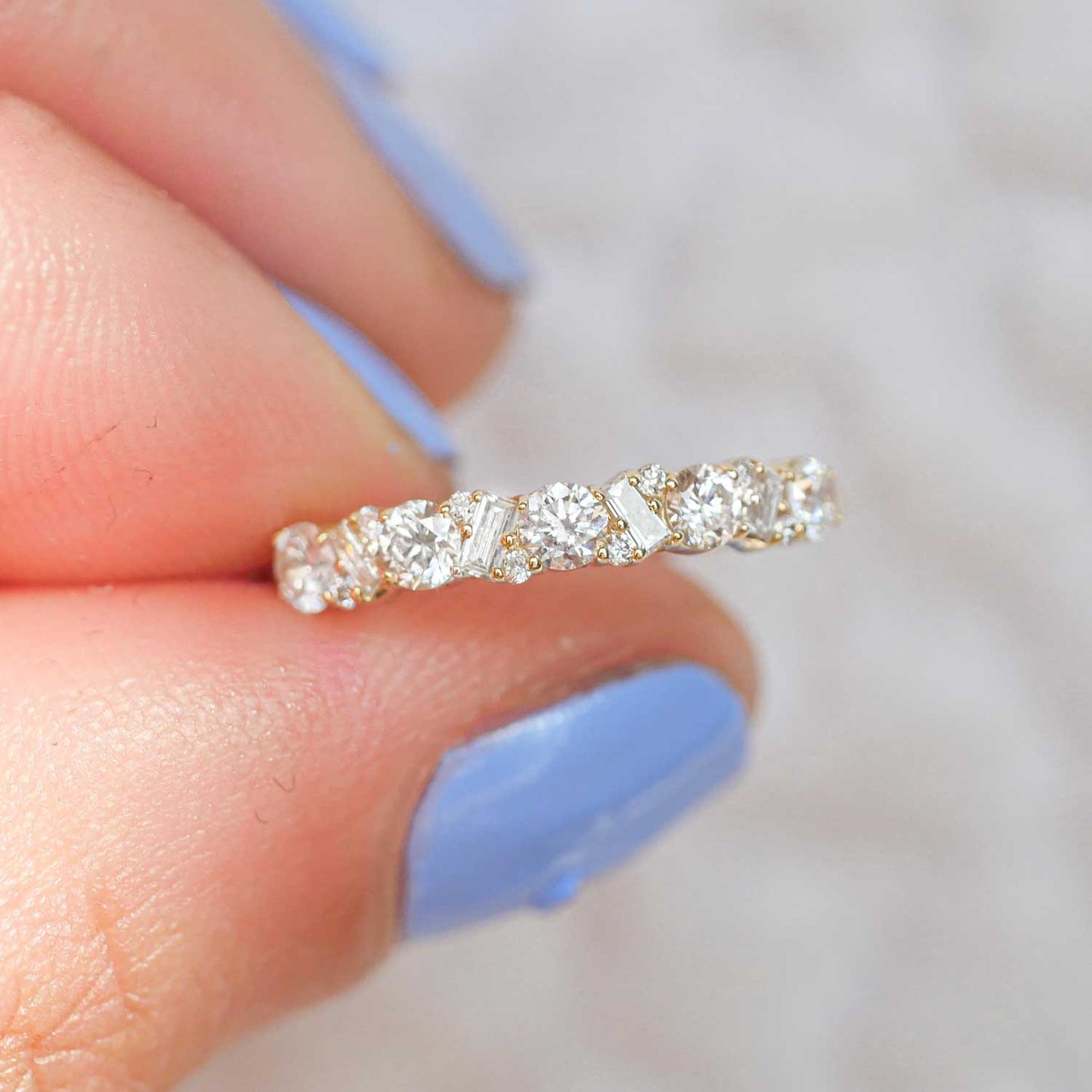 0.55 TCW Round and Baguette Cluster Wedding Band