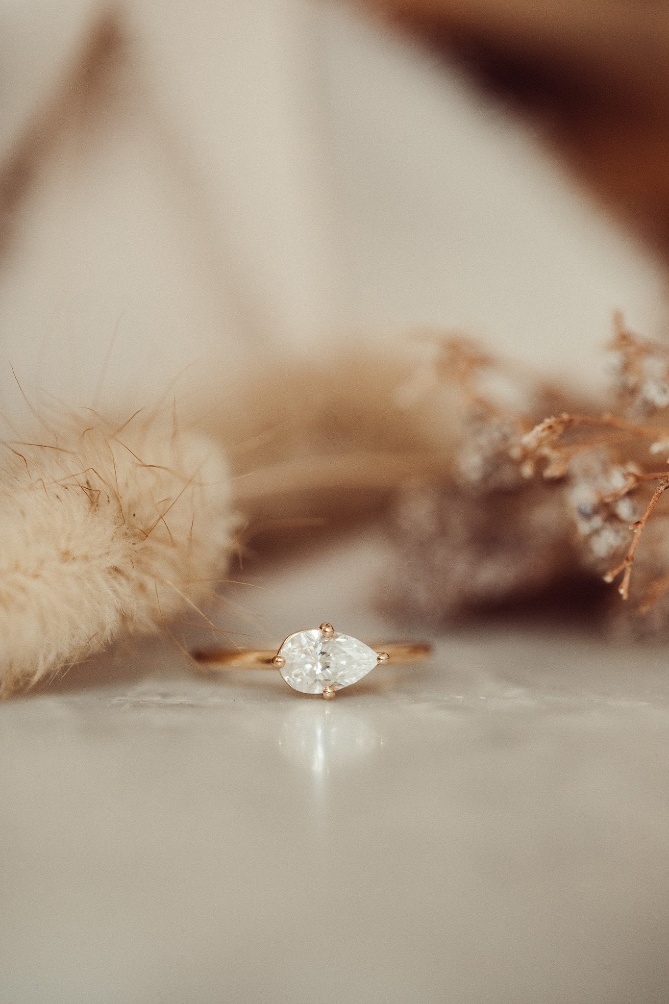 1.00 CT Carats east-west Pear Cut Moissanite diamond Solitaire Style Engagement Ring