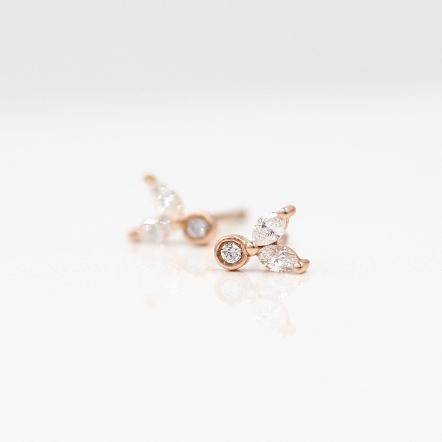 Caroline- 0.15 TCW Round & marquise Moissanite Three Stone Style Stud Earrings