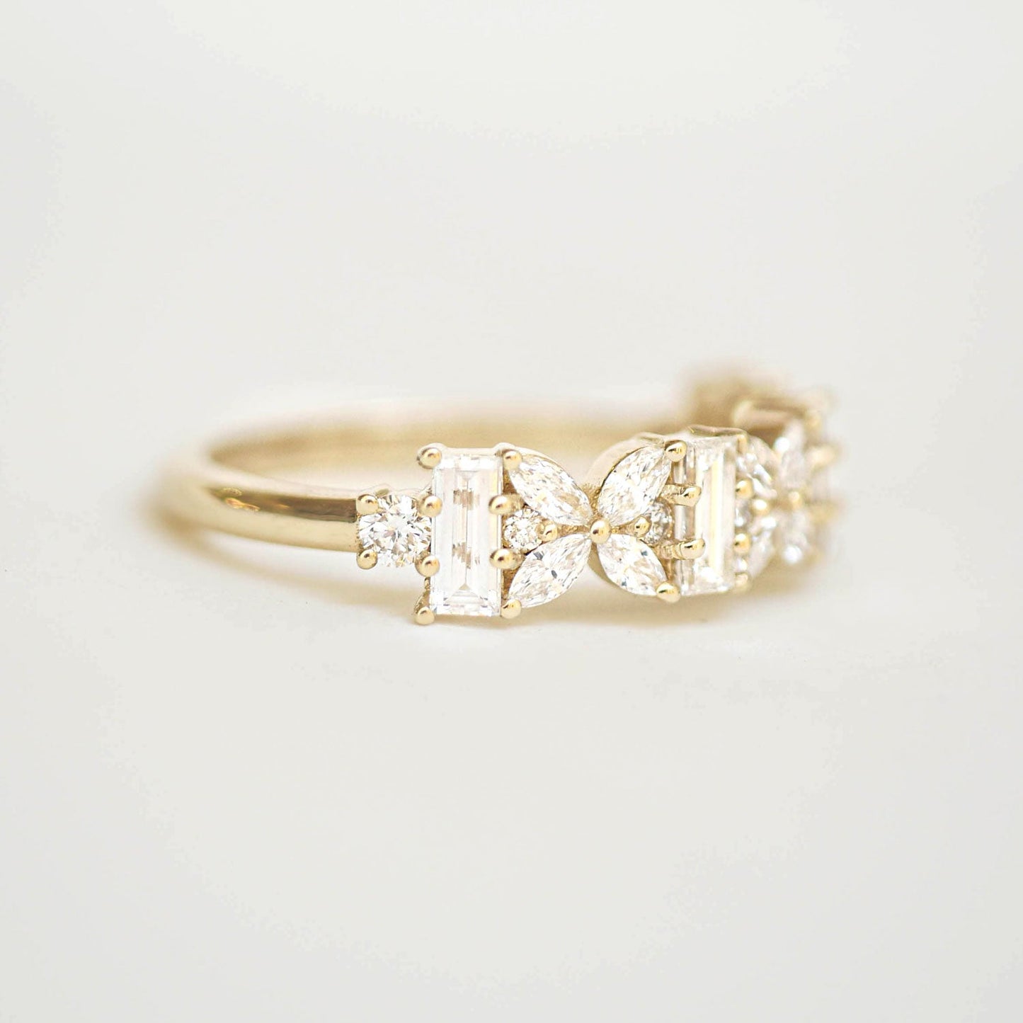 0.86 TCW Marquise, Baguette and Round cluster Wedding Band