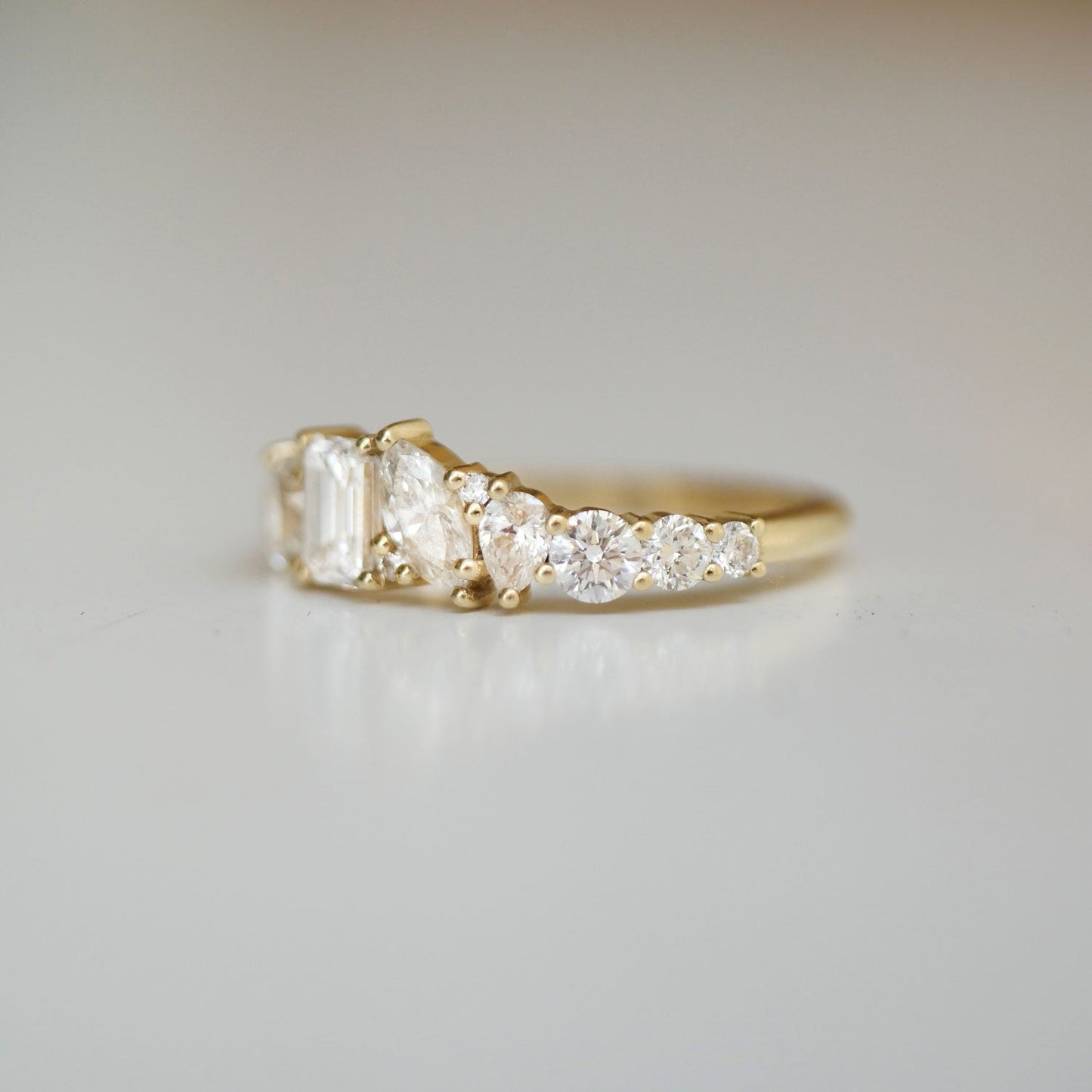 1.09 TCW Pear Marquise Oval Emerald and Round Cluster setting Wedding Band