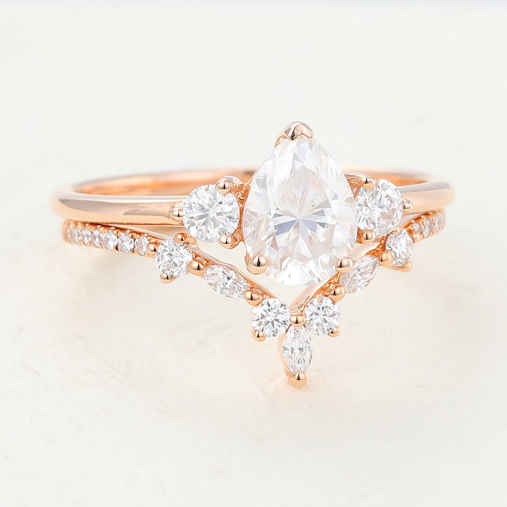 Jasper-1.5 Carats Pear Moissanite Three Stone Style Bridal Ring Set