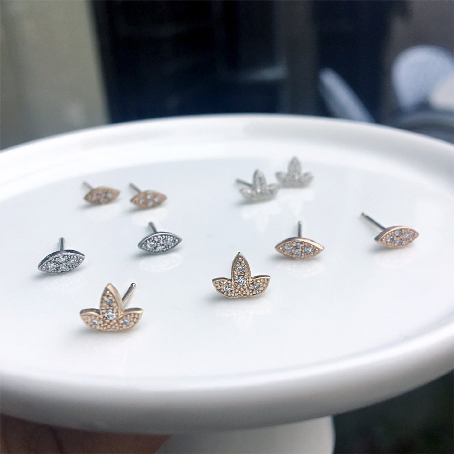 Evelyn- 0.05 TCW Round Moissanite leaf Stud Earrings