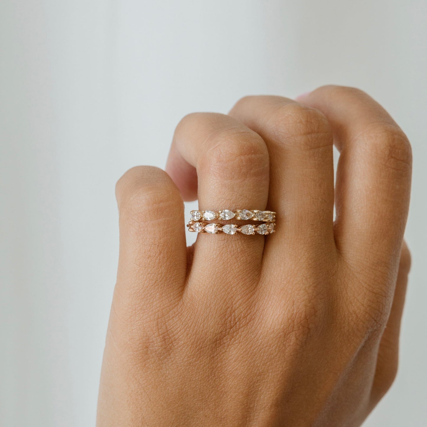 Alice-0.25 TCW Pear Moissanite Half Eternity Wedding Band