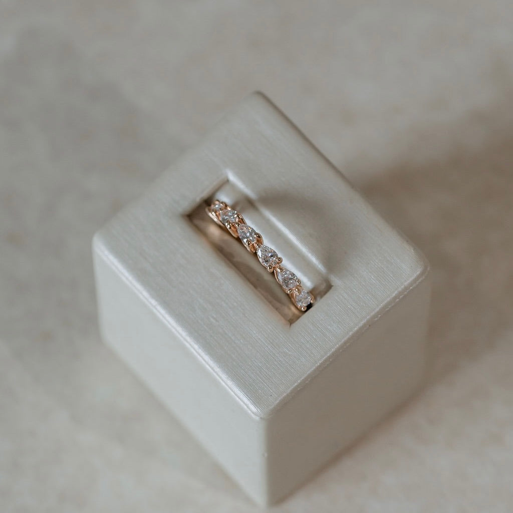 Alice-0.25 TCW Pear Moissanite Half Eternity Wedding Band