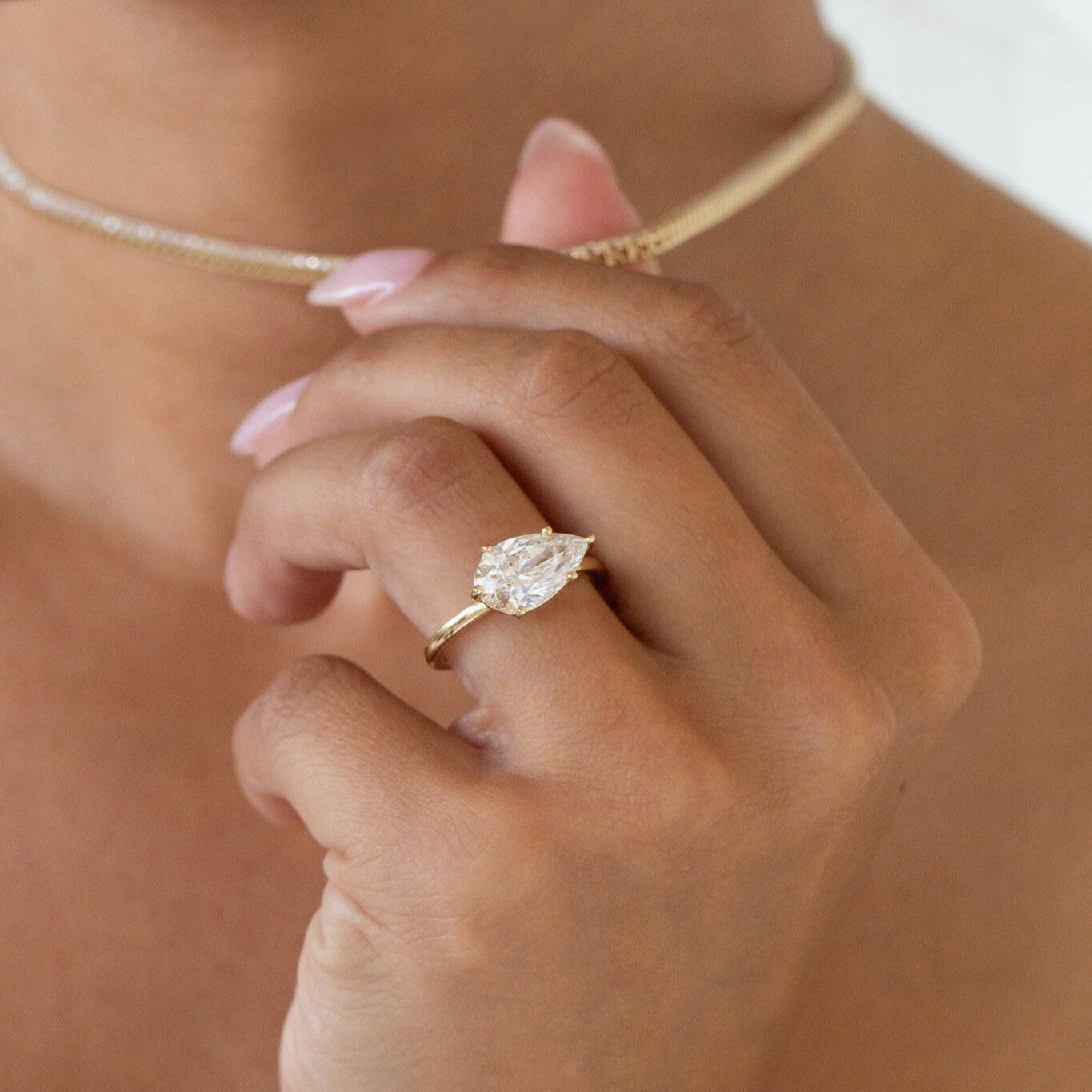 1.00 CT Carats east-west Pear Cut Moissanite diamond Solitaire Style Engagement Ring
